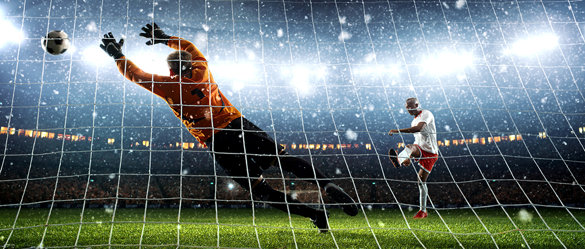 attacker,scores,a,goal,and,celebrates,victory,on,a,professional