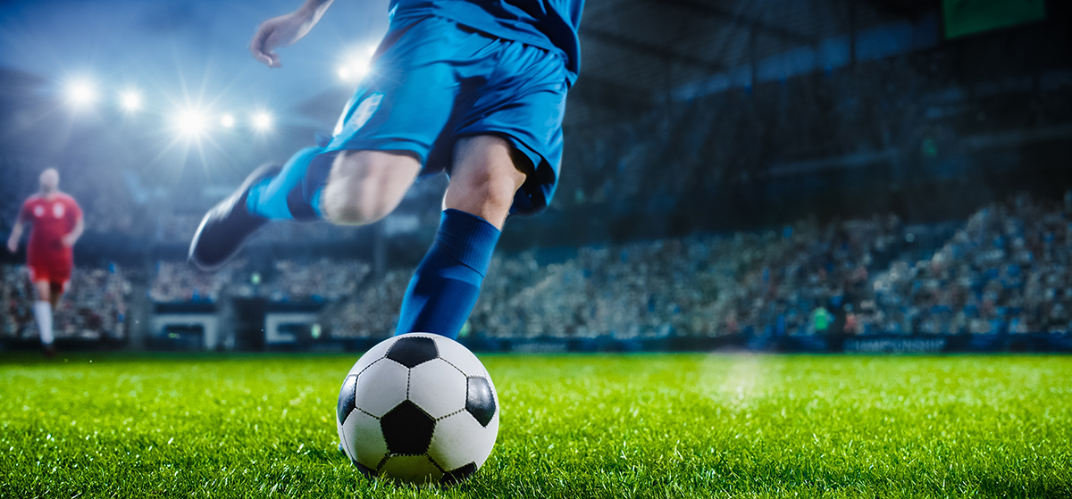 football,world,championship:,soccer,player,runs,to,kick,the,ball.