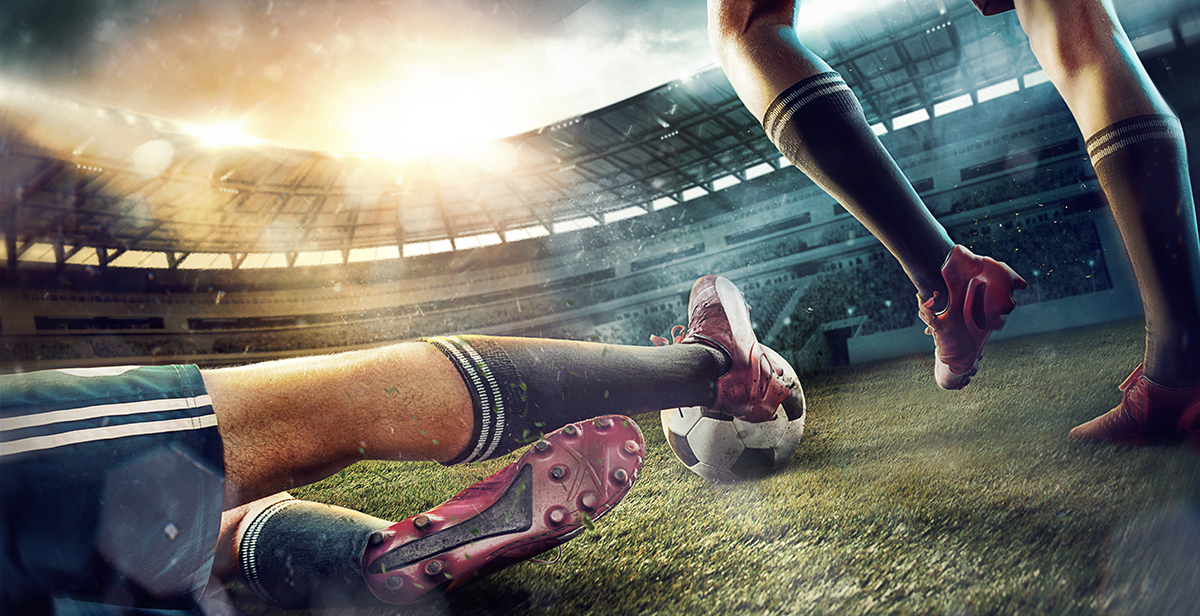 the,soccer,football,players,at,the,stadium,in,motion